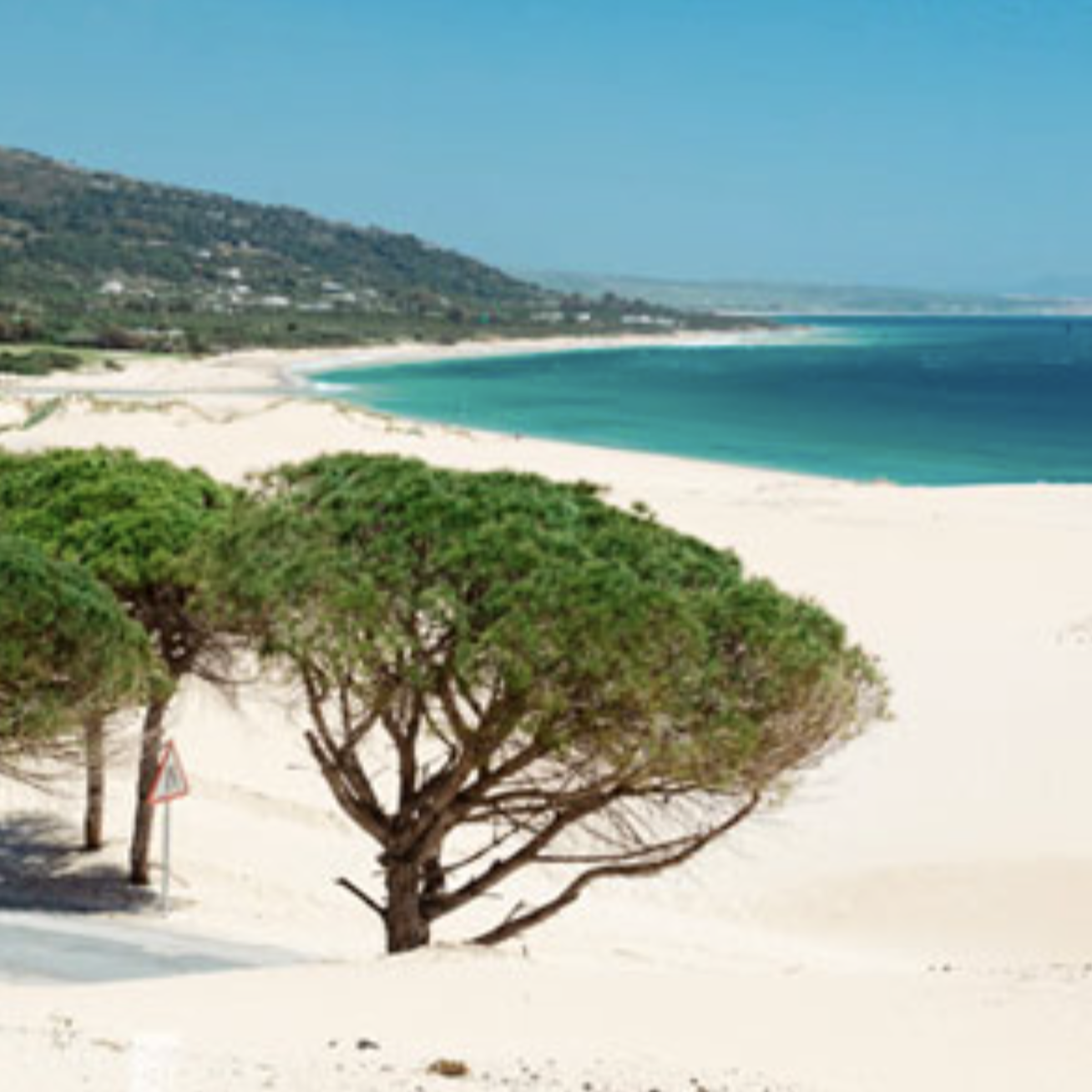 Tarifa, la Capital del Viento: Playas y Murallas Históricas